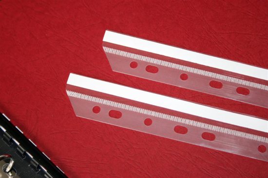 Self-adhesive spines for files